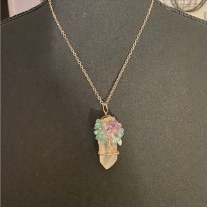 Clear quartz wrapped in a magical tree.